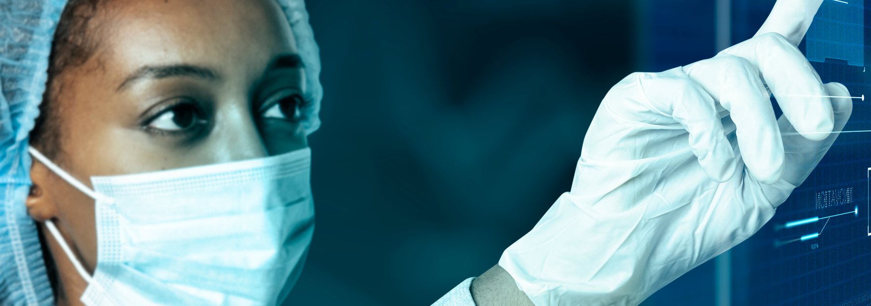 A clinician reviewing a medical imaging interface in a clinical setting